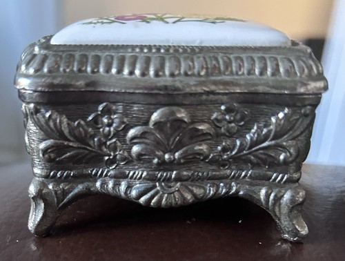 Vintage silver embossed oval