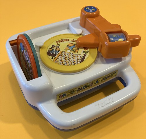 Vintage wind tomy bring - tomy,