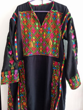 A Palestinian Jordanian Dress, Hand-Embroidered With An Antique Heritage Design.