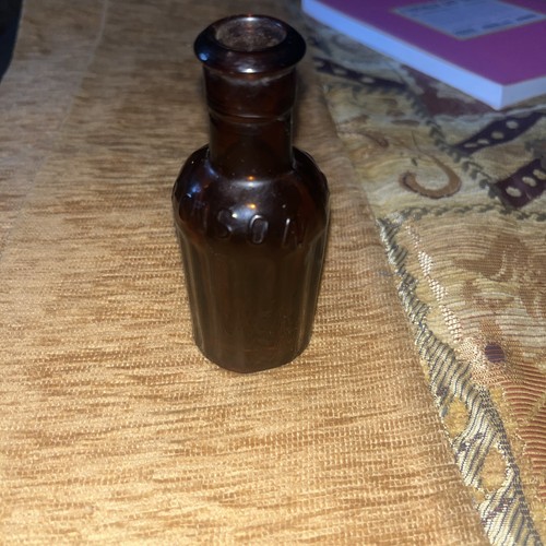 Vintage amber glass poison - amber,