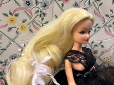 Vintage Pippa doll rerooted in blonde curly hair