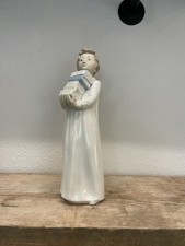 Nao By Lladro Boy Carrying