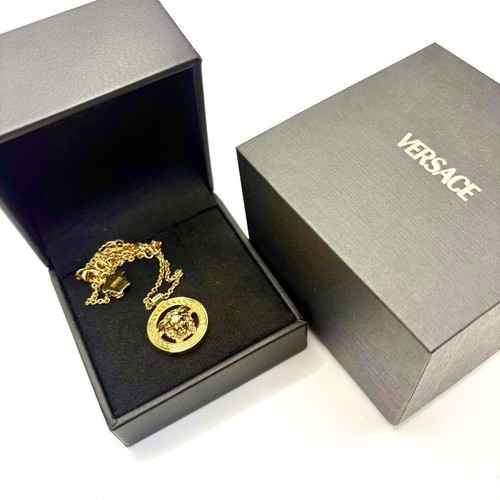 Versace medusa gold pendant - 95,