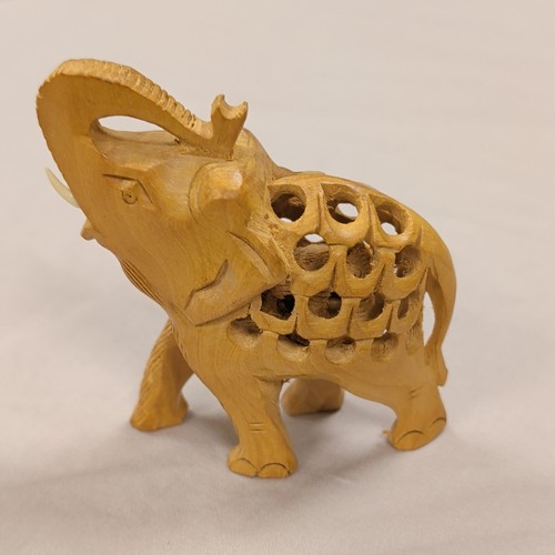 Hand carved wooden - hand, elephant