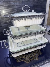 3pcs Silver serving dishes. 3 Diffrent sizes and comes with candle holder under.