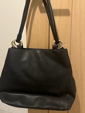 Black leather bag with gold