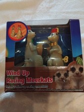 Wind racing meerkats with - ~, up