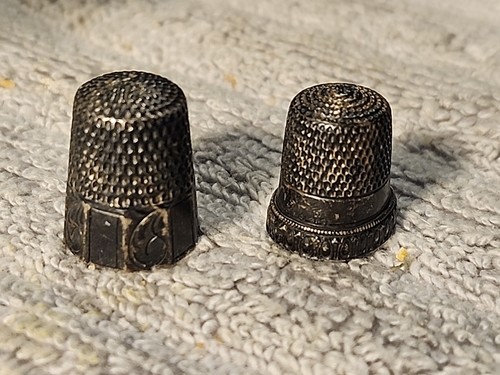Two antique marked sterling - two,