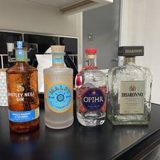 4 empty Spirit Bottles