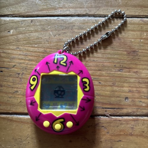 Tamagotchi pink yellow gen 1 - pink,