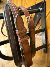 Driving reins. To suit single horse. Brown leather with soft folded hand parts. 