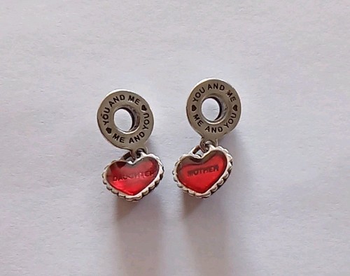 Pair mother and - of, 2