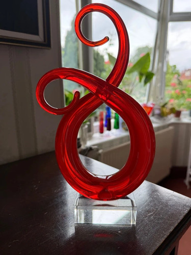 Art glass red swirl sculpture