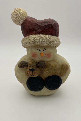 Snowman holding dog inches - snowman,