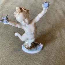 Metzler and Ortloff Cherub Standing On A Snail, Very Good Condition No Damage