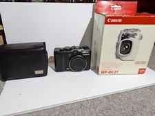 Canon Powershot G9 camera with underwater case, charger and soft case.