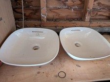 Unused Laufen hand wash basins