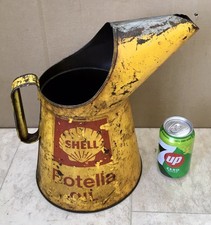 A VINTAGE SHELL ROTELLA ONE