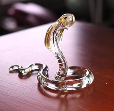 Cobra snake figurine hand