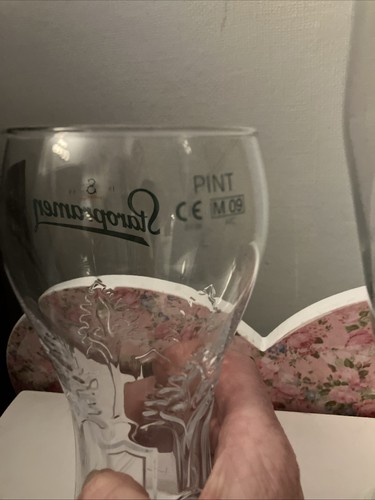 Two staropramen pint - pint, glasses