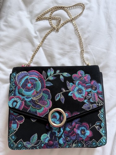 Black floral cross body bag"