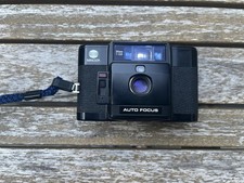 Minolta AF-C 35mm Auto Focus Camera with Flash Unit and Two Batteries