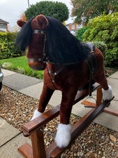 childs rocking horse by MJ Mark in chestnut with white fetlocks. Immaculate cond