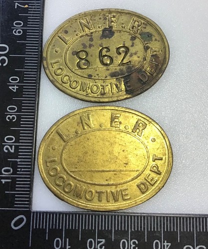 Two vintage oval - x, brass