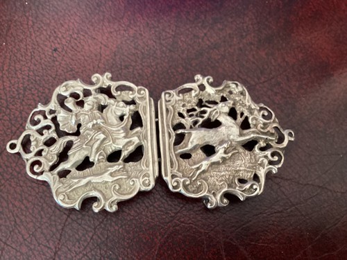 Silver nurses belt buckle