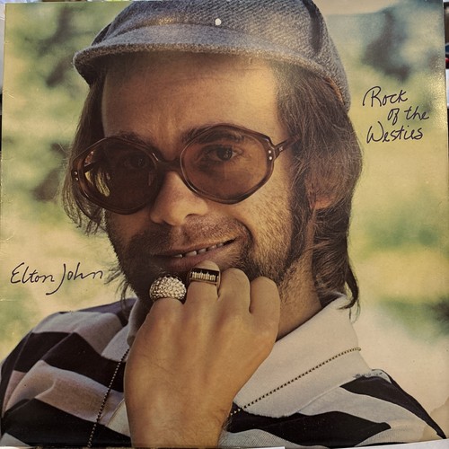Elton john rock of the - -,