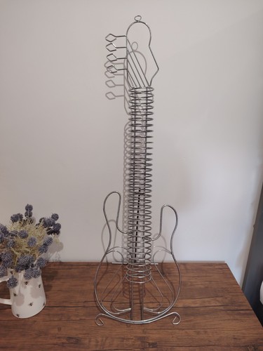 Guitar shaped metal storage - cd,