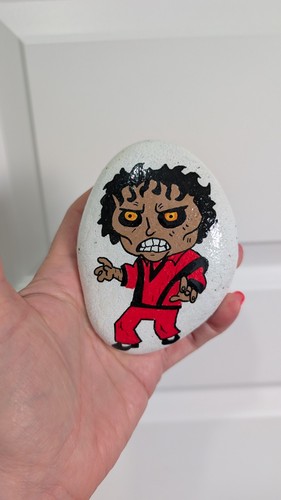 Hand painted pebble michael - hand,