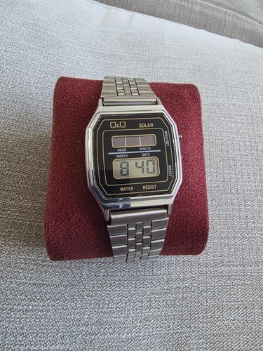 Vintage citizen solar - q&q,
