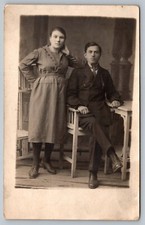 Postcard Man Woman Portrait Studio Antique Mission Furniture  Real Photo RPPC