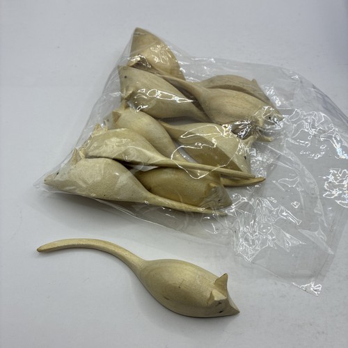 Hand carved wooden mice - hand,