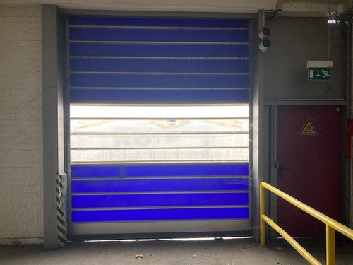 Roller door quick release door