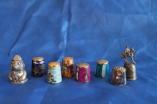 8 assorted  thimbles, 6 enamelled, 2 pewter