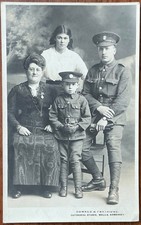 RPPC WW1 FAMILY PORTRAIT ARMY SERVICEMAN & BOY IN UNIFORM WELLS SOMERSET D & P