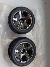 New Unused Traxxas Alias Wheels and Tyres For Front of 2wd Rustler. Dark Chrome