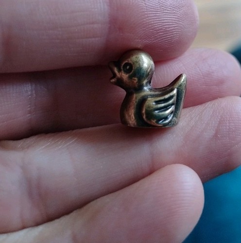 Very small tiny rubber duck - very,