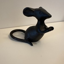 Cast iron mouse ornament in a