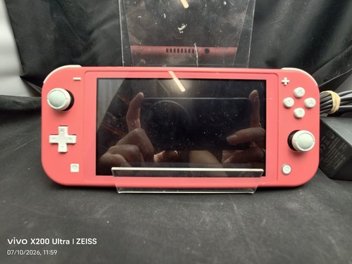 Nintendo switch lite coral - nintendo,