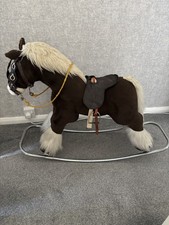 Vintage Merrythought Rocking Horse with saddle, stirrups/reins. 76cm H, 114cm L.