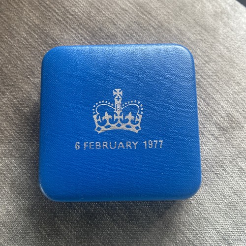 One empty royal mint 1977 - empty,