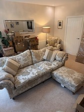 2 seater sofa with matching armchair & footstool in neutral floral upholstery