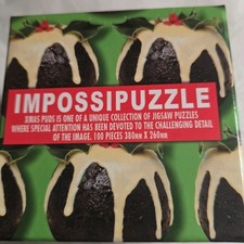 Impossipuzzle Christmas Puddings 100 Piece Jigsaw Puzzle Complete