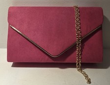 KOKO Hot pink suede effect clutch bag with detachable chain strap. Good cond