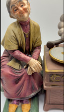 Old woman listening to records