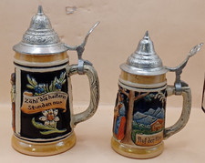 Pair of Vintage ceramic beer steins with metal lid  Germany
