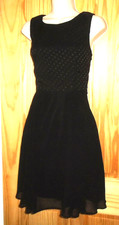 Black sheer skirt spot top party skater dress fits size 6-8 (size 10 label)